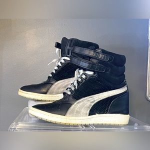 Women 8 Puma wedge hightops sneakers